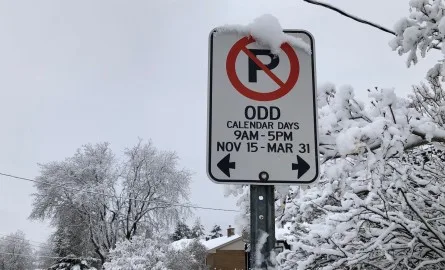 A Thunder Bay calendar-parking sign in winter. Check the signs and current city activation notice for your street.
